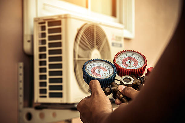 Professional Ac Installation technician working in Triangle, VA